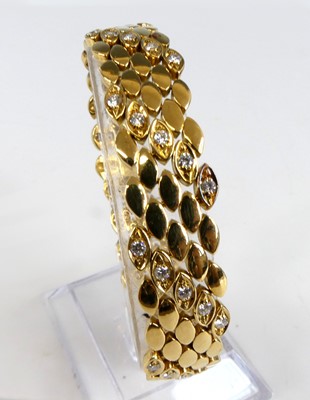 Lot 2340 - An 18ct yellow gold diamond set articulated...