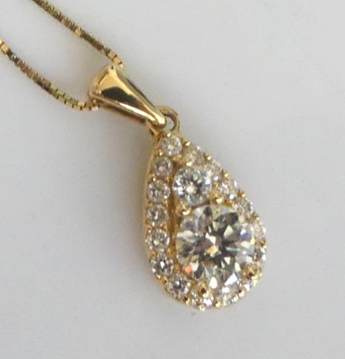 Lot 2281 - An 18ct yellow gold diamond pear shaped...