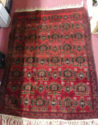 Lot 1166 - A Turkoman woollen rug, 20th century,...