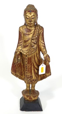 Lot 6 - A gilt painted wooden figure of Buddha,...