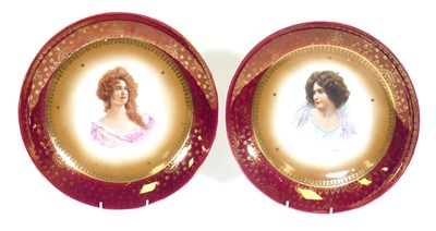 Lot 15 - A pair of Vienna porcelain chargers, each...