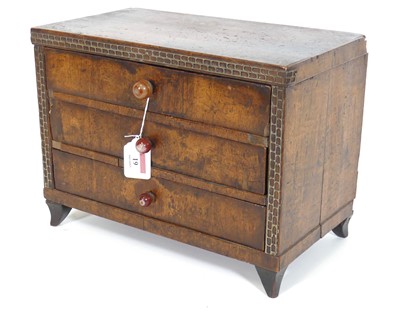 Lot 19 - A 19th century fruitwood table-top chest,...