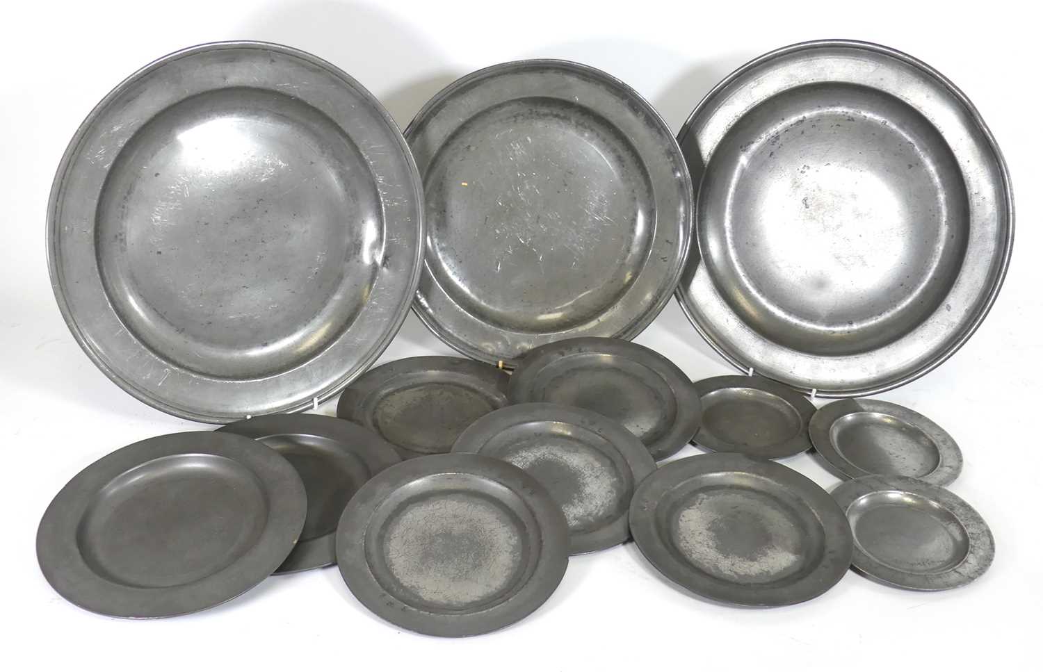 Lot 51 - A pair of 19th century pewter chargers,...