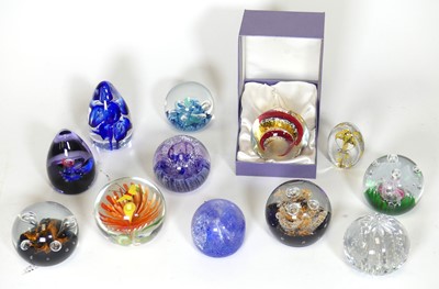 Lot 59 - A collection of art glass paperweights, to...