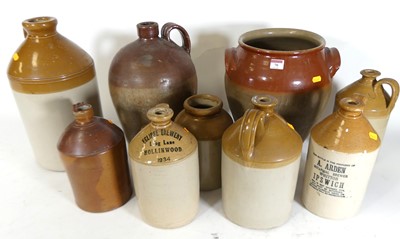 Lot 70 - A collection of stoneware jars and bottles,...
