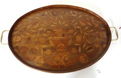 Lot 86 - An Edwardian walnut twin handled tray, of oval...