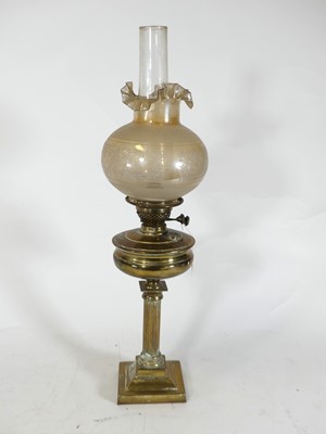 Lot 97 - A 19th century oil lamp, having floral...