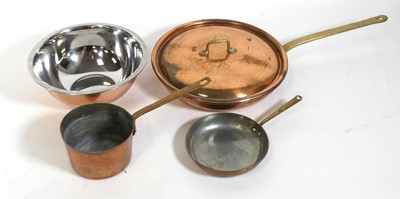 Lot 111 - A copper frying pan, having a tinned interior...