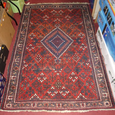 Lot 1165 - A Persian woollen Qashqai rug, the central...