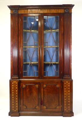 Lot 2513 - An antique mahogany freestanding corner...