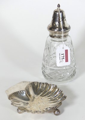 Lot 175 - A George V silver butter dish, of shell shape,...