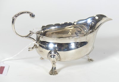 Lot 178 - An 18th century silver sauceboat, of helmet...
