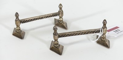 Lot 183 - A pair of Edwardian cast silver knife rests,...
