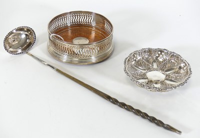 Lot 188 - An Elizabeth II silver bottle coaster, having...