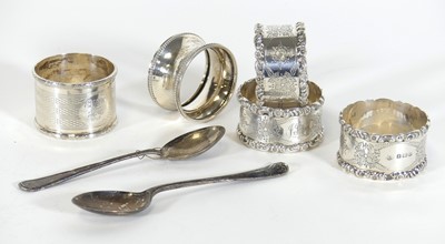 Lot 197 - A set of three Edwardian silver napkin rings,...