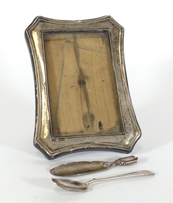 Lot 198 - A silver clad easel photograph frame, of...