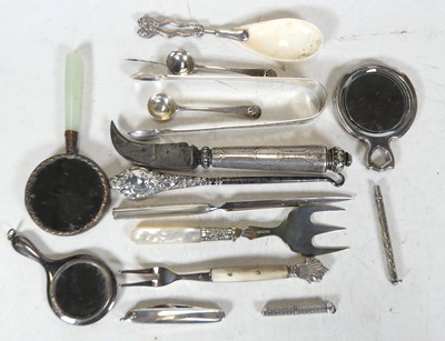 Lot 232 - A pair of 19th century silver sugar tongs,...