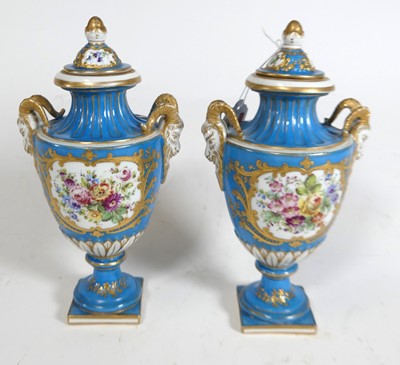 Lot 119 - A pair of Sèvres style porcelain urns and...