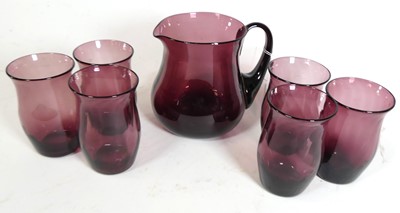 Lot 121 - A mid-20th century amethyst glass lemonade set,...