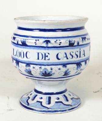 Lot 132 - A Dutch Delft blue and white drug jar 'LOOC DE...