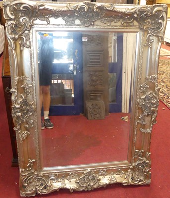 Lot 1130 - A contemporary silvered pierced and floral...