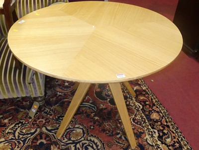 Lot 1131 - A contemporary blond oak and ply circular...