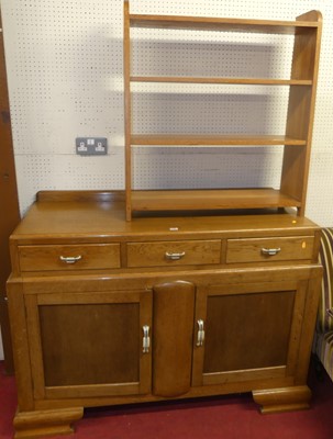 Lot 1135 - An Art Deco oak ledgeback sideboard, width...