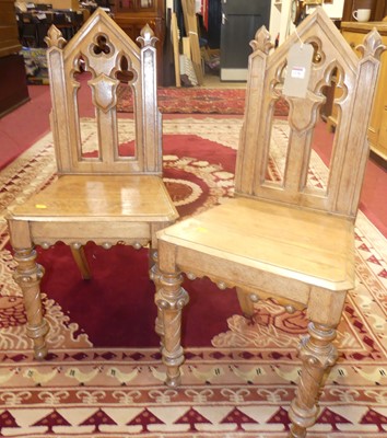 Lot 1136 - A pair of Victorian Gothic Revival oak...