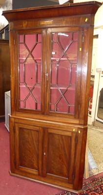 Lot 1165 - A 19th century mahogany freestanding corner...