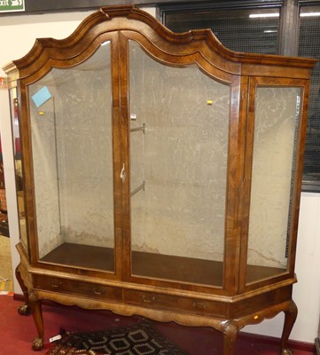 Lot 1156 - A large figured walnut four door glazed...