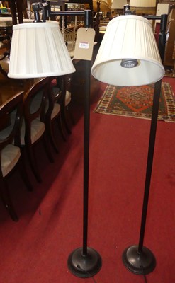 Lot 1205 - A pair of contemporary burnished metal floor...