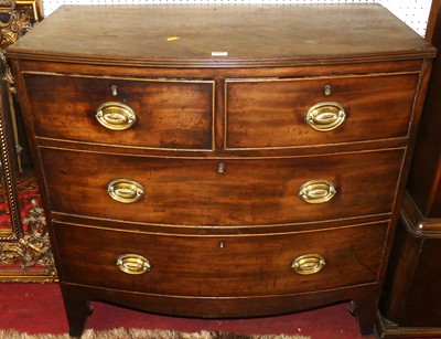 Lot 1143 - A small Regency mahognay bowfront chest of two...