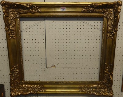 Lot 1147 - A floral decorated gilt picture frame, overall...