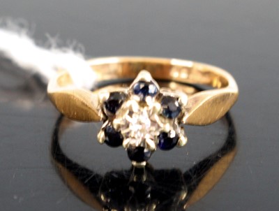 Lot 287 - A modern 9ct gold sapphire and diamond point...