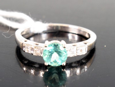 Lot 289 - A modern 9ct white gold blue topaz and cz set...