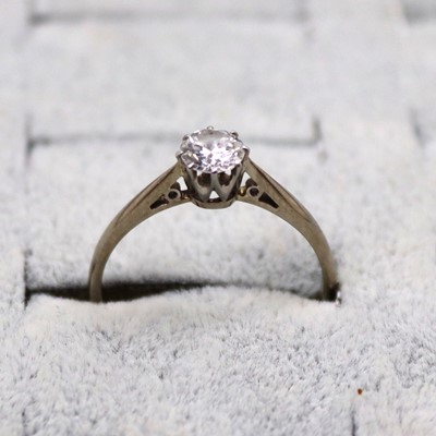 Lot 301 - A platinum diamond solitaire ring, the claw...