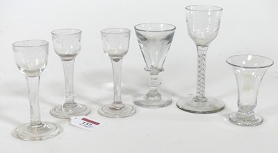 Lot 137 - An 18th century wine glass, the wrythen bucket...