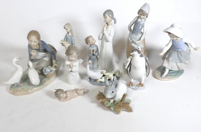 Lot 139 - A collection of Lladro porcelain figures, to...