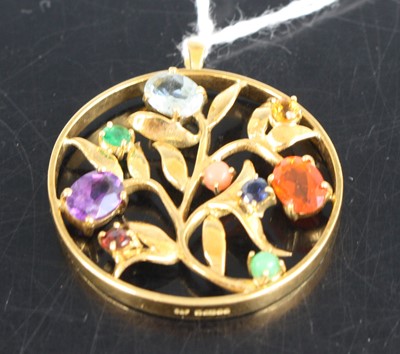 Lot 320 - An 18ct gold semi-precious multi-stone set...