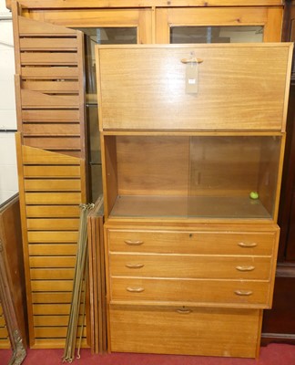 Lot 1213 - A 1970s Ladderax teak modular four-bay wall...