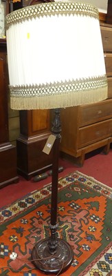 Lot 1215 - A reproduction standard lamp, with pleated...