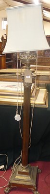 Lot 1216 - A gilt brass standard lamp, the composition...
