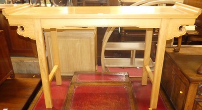 Lot 1224 - A contemporary Eastern blond elm hall table,...