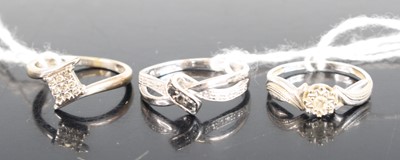 Lot 330 - A 9ct white gold sapphire and diamond point...