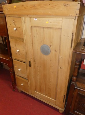 Lot 1234 - A reclaimed rustic pine food cupboard, having...