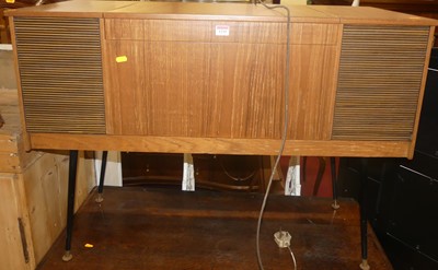 Lot 1235 - A 1970s teak music centre, the hinged cover...