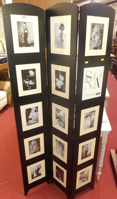Lot 1237 - A contemporary black lacquered three-fold...