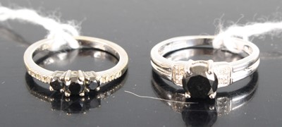 Lot 337 - A modern 9ct white gold sapphire and diamond...