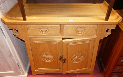 Lot 1246 - A contemporary Eastern blond ash double door...