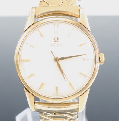 Lot 340 - An Omega 9ct gold cased automatic wristwatch...